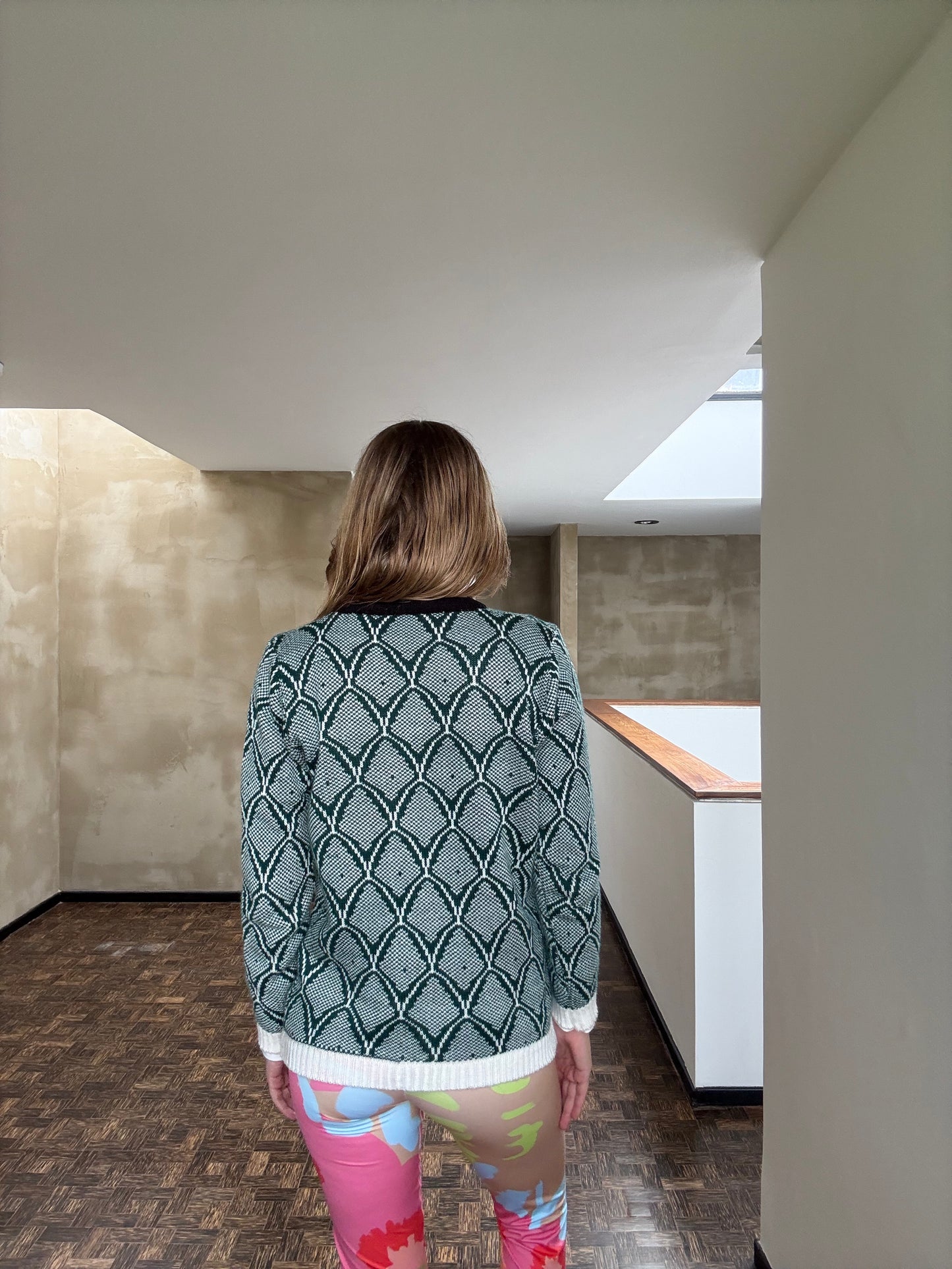 Saco tejido serpiente verde oscuro con blanco