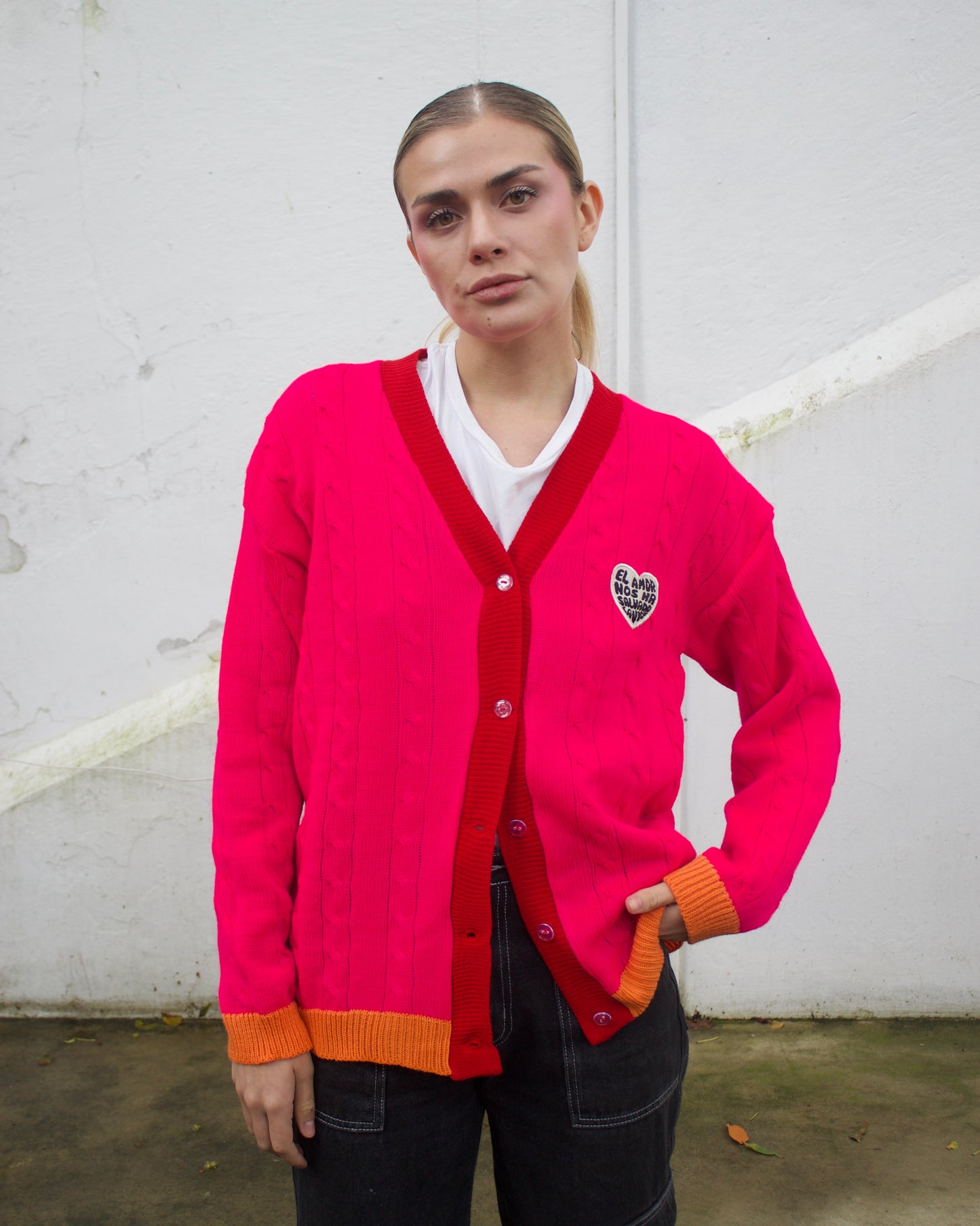 Saco tejido fucsia con naranja