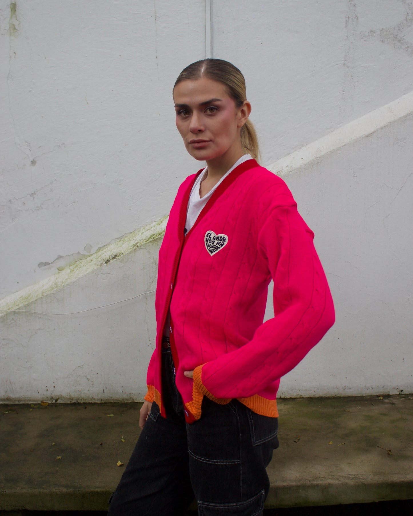 Saco tejido fucsia con naranja
