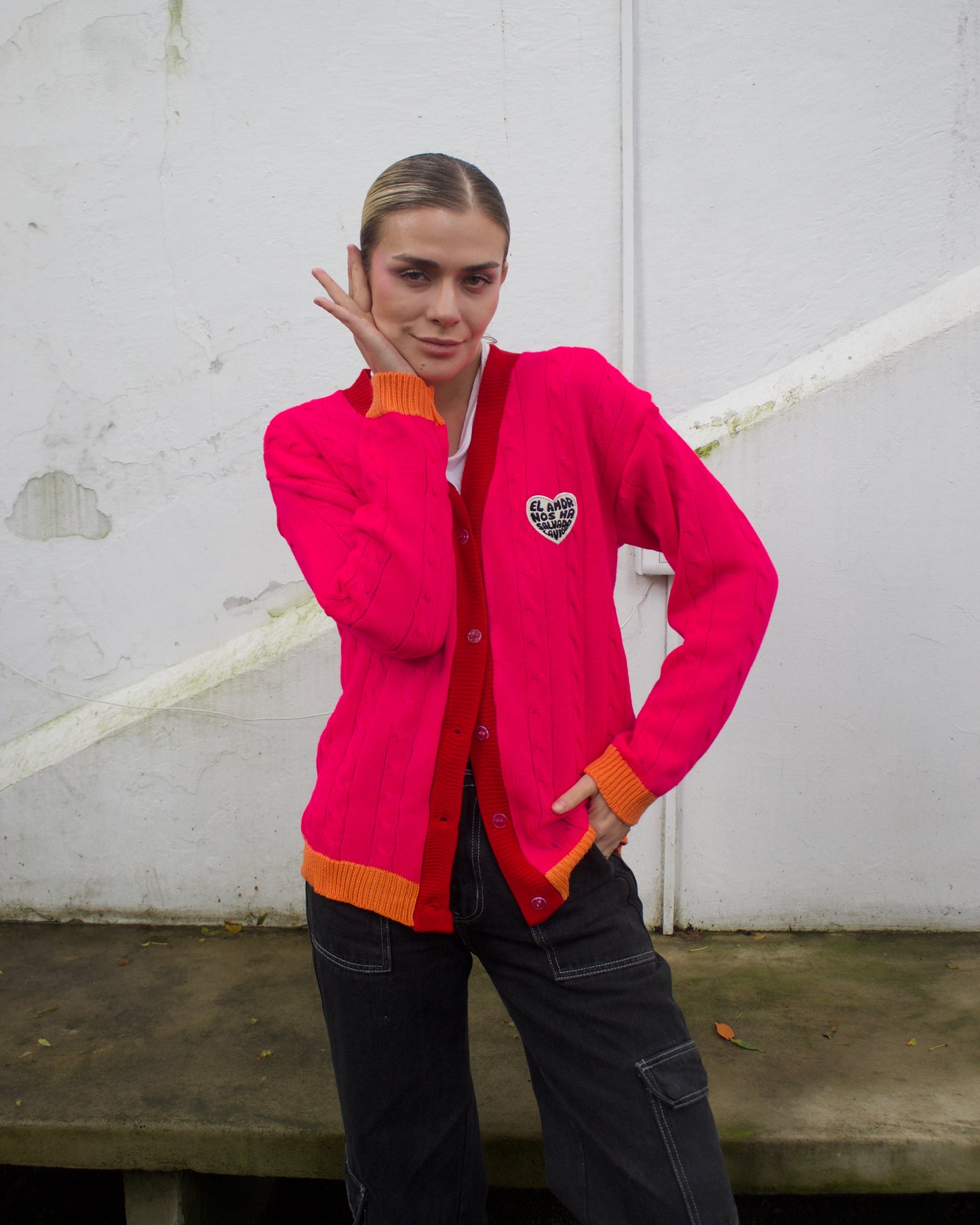 Saco tejido fucsia con naranja