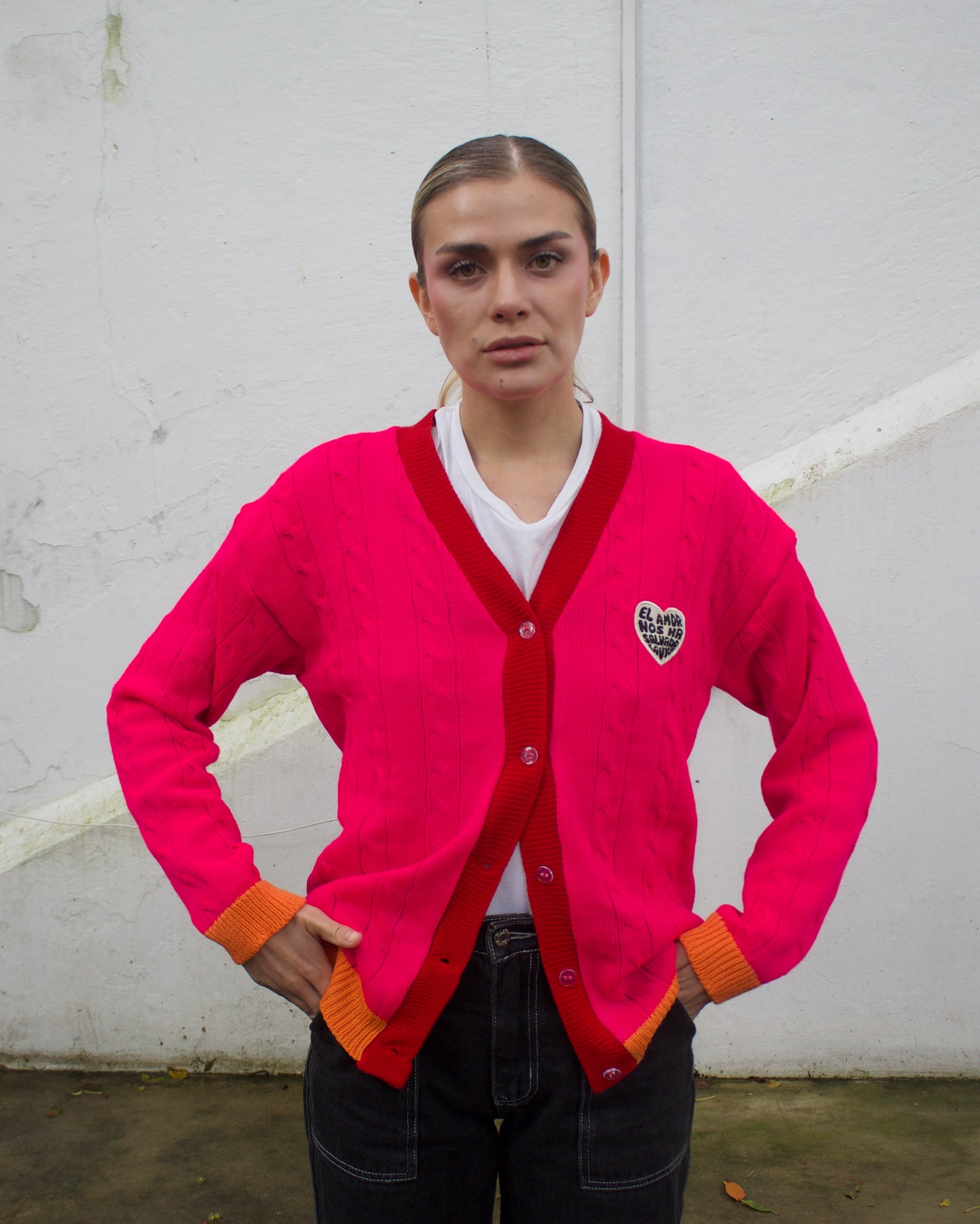 Saco tejido fucsia con naranja