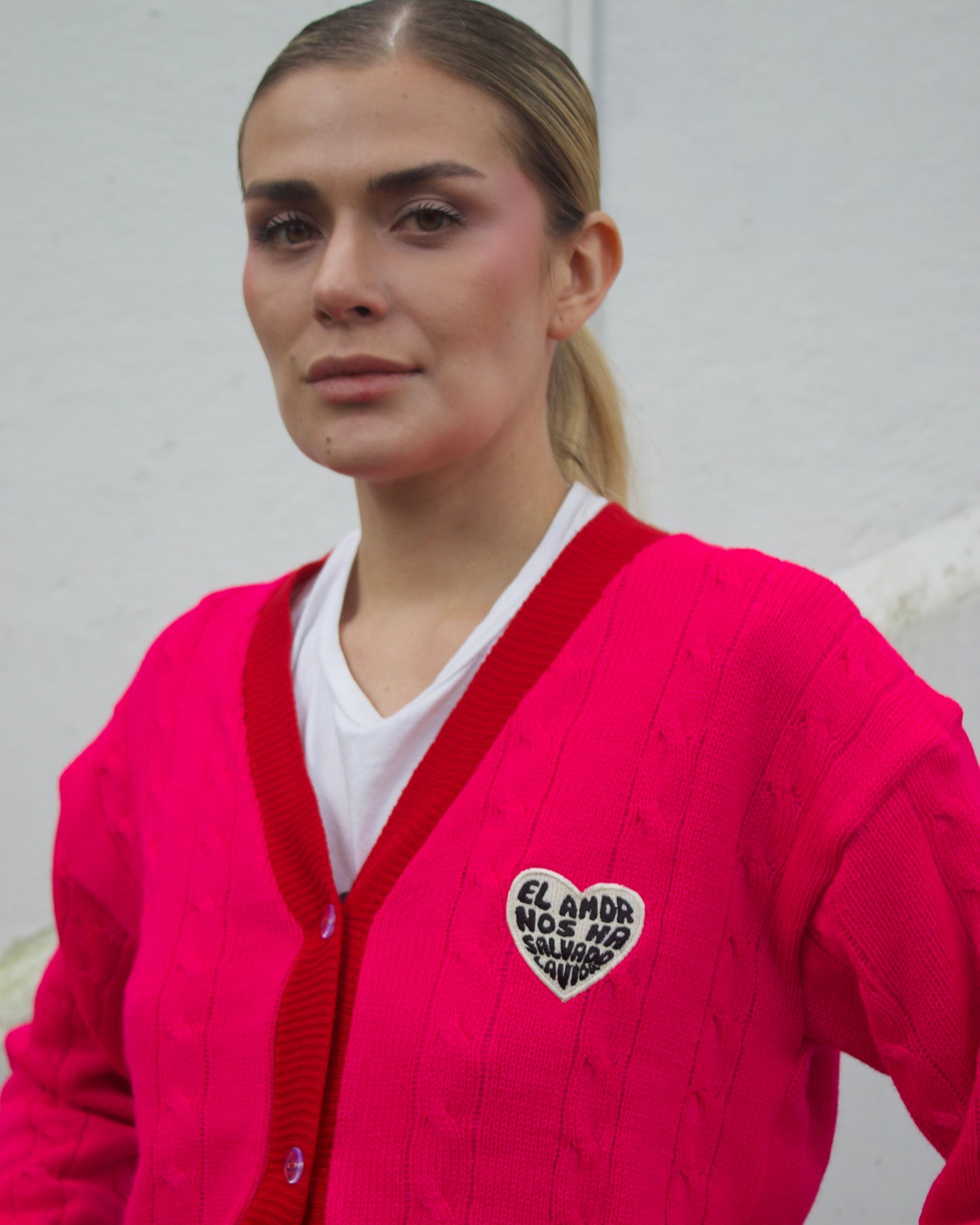 Saco tejido fucsia con naranja